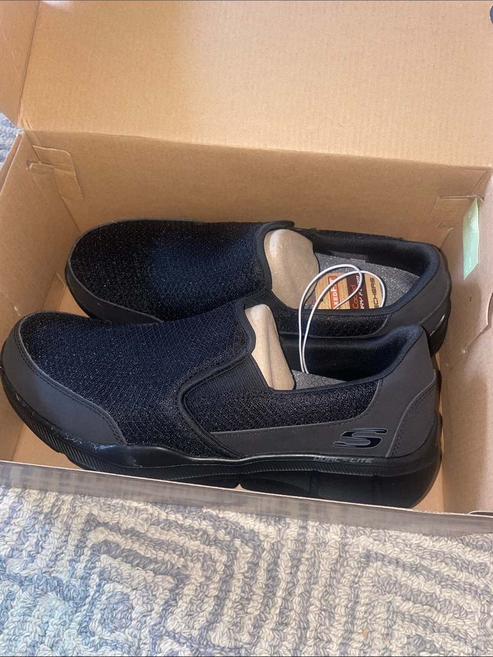 BNIB Skechers Black Slip-On Air cooled Memory Foam footbed loafers, size 9